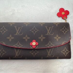 Louis Vuitton Monogram Clutch with Red Floral Accent